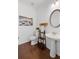 Half bathroom featuring a pedestal sink, wood accent pieces, and light, neutral colors at 261 Highland Village Ln, Woodstock, GA 30188