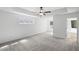 Spacious main bedroom with trey ceilings, ceiling fan, plush carpeting and plenty of natural light at 261 Highland Village Ln, Woodstock, GA 30188