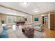 Finished basement area with a billiards table and seating, and walkout doors at 5265 Bentley Hall Dr, Alpharetta, GA 30005