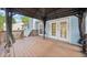 Exterior deck with gazebo and access to the backyard through glass doors at 5265 Bentley Hall Dr, Alpharetta, GA 30005