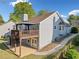 Aerial of the home showing the deck and patio areas along with the bay window at 5265 Bentley Hall Dr, Alpharetta, GA 30005