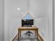 This office is well lit with natural light, hardwood floors, and white trim at 1774 Vesta Ave, Atlanta, GA 30337
