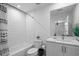 Bathroom showcasing subway tiles in the shower and a vanity with modern fixtures at 2614 Talley St, Decatur, GA 30030