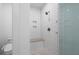Modern bathroom featuring tiled shower with a glass enclosure and bench at 2614 Talley St, Decatur, GA 30030