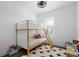 bedroom featuring a playful bunk bed, fun decor, and a bright window at 2614 Talley St, Decatur, GA 30030