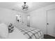 Cozy bedroom featuring a ceiling fan and an ensuite bathroom at 2614 Talley St, Decatur, GA 30030