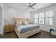 Bright, neutral bedroom with hardwood floors, large windows, and ceiling fan at 2614 Talley St, Decatur, GA 30030