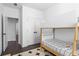 bedroom featuring a playful bunk bed and lots of closet space at 2614 Talley St, Decatur, GA 30030