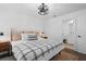Comfortable bedroom featuring a bed, nightstands, and an ensuite bathroom at 2614 Talley St, Decatur, GA 30030