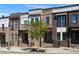 Charming brick townhomes with balconies and well-maintained landscaping, exuding curb appeal at 2614 Talley St, Decatur, GA 30030