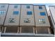 Townhome exterior with garage doors, offering a clean and contemporary aesthetic at 2614 Talley St, Decatur, GA 30030