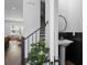 Entryway powder room and staircase with modern fixtures and neutral decor at 2614 Talley St, Decatur, GA 30030