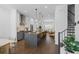 Open-concept kitchen with large island, stainless steel appliances, and modern finishes at 2614 Talley St, Decatur, GA 30030
