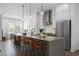 Spacious kitchen with a large island and a breakfast bar with stylish pendant lighting at 2614 Talley St, Decatur, GA 30030