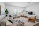 Bright living room featuring modern furnishings, large windows, and a comfortable layout at 2614 Talley St, Decatur, GA 30030