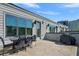 Spacious patio area with outdoor dining set and grill at 2614 Talley St, Decatur, GA 30030