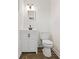 Updated bathroom featuring a new vanity and toilet at 262 E Main St, Rutledge, GA 30663