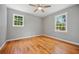 Empty bedroom with hardwood floors and lots of natural light at 262 E Main St, Rutledge, GA 30663