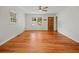 Hardwood floors and natural light fills the living room with attached kitchen at 262 E Main St, Rutledge, GA 30663