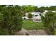 Inviting park with a charming gazebo and playground, surrounded by lush greenery and the town's quaint buildings at 262 E Main St, Rutledge, GA 30663