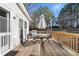 Comfortable back porch with a table and chairs set for outdoor dining and relaxation at 4941 N Helton Rd, Winston, GA 30187