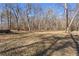 A large cleared backyard offers ample space for outdoor activities and recreation at 4941 N Helton Rd, Winston, GA 30187