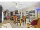 Dining room showcasing a table, chairs, and views of the treed landscape at 4941 N Helton Rd, Winston, GA 30187