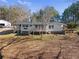 Ranch-style home with decks, situated on a treed lot with separate garage at 4941 N Helton Rd, Winston, GA 30187