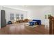 Bonus room with hardwood floors, and reading/play area at 779 Keystone Dr, Woodstock, GA 30188