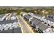 Aerial view of new townhome community featuring modern design and convenient street access at 1008 Knoxboro Ln, Woodstock, GA 30188