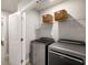 Functional laundry room with modern washer and dryer at 1008 Knoxboro Ln, Woodstock, GA 30188