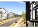 Charming townhome community featuring modern architecture, sidewalks, and well-manicured landscaping at 1008 Knoxboro Ln, Woodstock, GA 30188