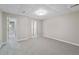 Finished basement with neutral walls, plush carpet, and doorways leading to other spaces at 1755 Pinetree Pass Sw Ln, Lilburn, GA 30047