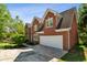 Beautiful two-story brick home with an attached two-car garage at 1755 Pinetree Pass Sw Ln, Lilburn, GA 30047