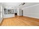 Open living room featuring hardwood flooring at 1755 Pinetree Pass Sw Ln, Lilburn, GA 30047