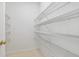 Walk-in pantry with shelving at 1755 Pinetree Pass Sw Ln, Lilburn, GA 30047