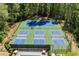 Aerial view of the tennis courts and pickleball courts, and the community pool at 1755 Pinetree Pass Sw Ln, Lilburn, GA 30047