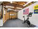 Spacious basement gym featuring workout equipment and accessories with an American flag on the wall at 4086 Norton Se Pl, Smyrna, GA 30082