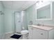Neat bathroom featuring a glass shower, vanity with cabinet and stylish mirror at 4086 Norton Se Pl, Smyrna, GA 30082