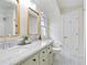 Bathroom displays a dual sink vanity and patterned floor at 4086 Norton Se Pl, Smyrna, GA 30082