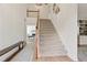 Bright foyer with a staircase, hardwood floors, and neutral walls, creating an inviting and spacious entrance at 4086 Norton Se Pl, Smyrna, GA 30082