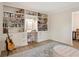 Cozy home office featuring built-in bookshelves, a comfortable workspace, and soft, natural light at 4086 Norton Se Pl, Smyrna, GA 30082