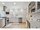 Charming kitchen features updated stainless appliances, lots of storage, and a built-in desk area at 4086 Norton Se Pl, Smyrna, GA 30082