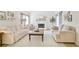 Inviting living room featuring comfortable sofas, a fireplace, and a cozy atmosphere, perfect for relaxation and gatherings at 4086 Norton Se Pl, Smyrna, GA 30082