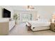 Serene primary bedroom featuring a bay window, natural light, and neutral tones at 4086 Norton Se Pl, Smyrna, GA 30082