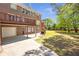 Expansive backyard with a patio and outdoor fireplace, perfect for entertaining at 4095 Boles Creek Dr, Duluth, GA 30096
