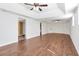 Finished basement featuring hardwood floors and built-in shelving, creating a versatile space at 4095 Boles Creek Dr, Duluth, GA 30096