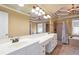 Bathroom featuring double vanities, tile floors, tile shower, and a garden tub at 4095 Boles Creek Dr, Duluth, GA 30096