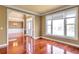 Foyer featuring hardwood floors, natural light, and an open entry to the dining room at 4095 Boles Creek Dr, Duluth, GA 30096