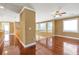 Upstairs landing featuring wood floors and wooden railing overlooking the floor below at 4095 Boles Creek Dr, Duluth, GA 30096